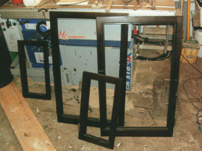 DArk window frames in workshop